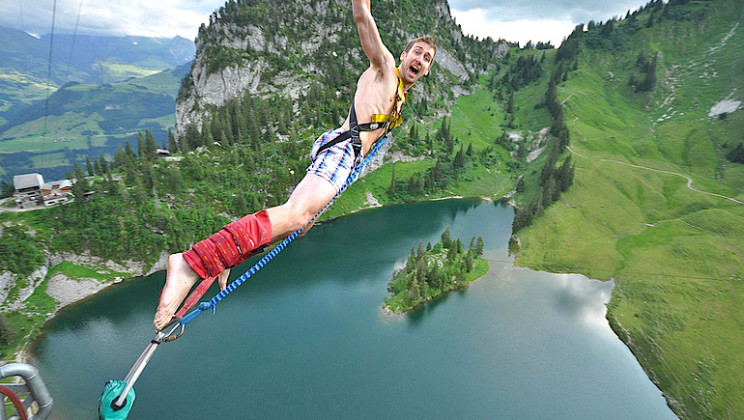 man bungee jumping